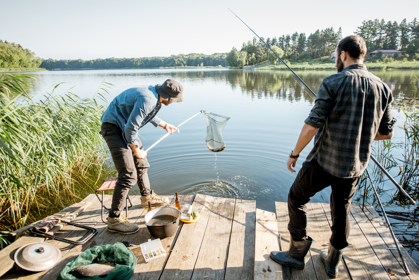 Fishermen Catching Fish with Net